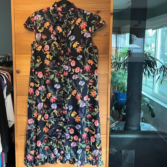 Black Floral Print Dress Cap Sleeve and Ruffled Hem. - Picture 3 of 12